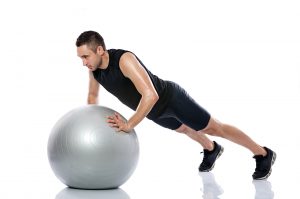 Man doing pilates ball